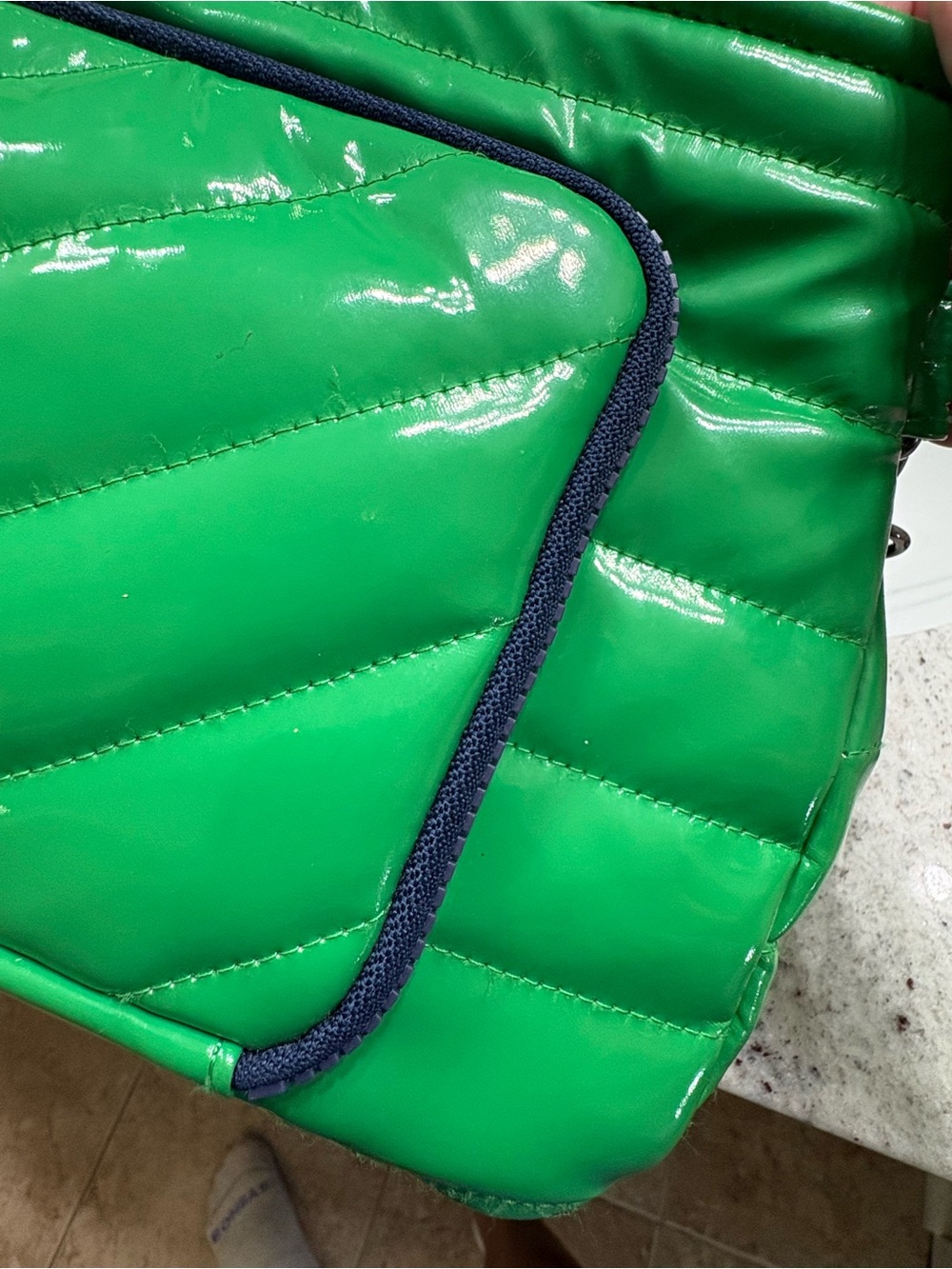 THINK ROYLN Green Quilted Shoulder Bag with Navy Trim